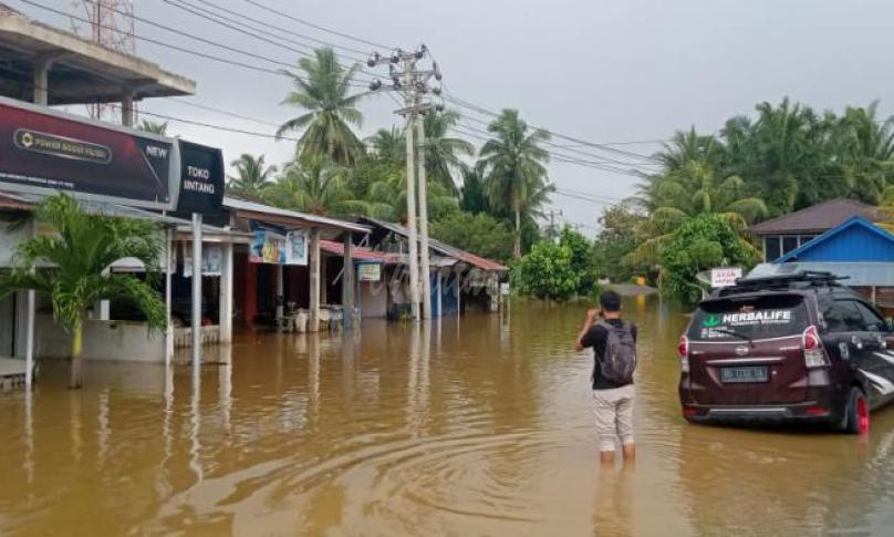 Banjir yang merendam pemukiman warga di SAM dan SA