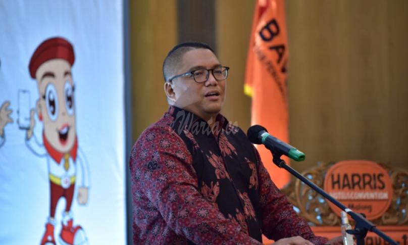  Koordinator Divisi Hukum, Humas, Data, dan Informasi Bawaslu Fritz Edward Siregar memberikan sambutan dalam Rapat Koordinasi Nasional Evaluasi Pengawasan Pilkada 2020 di Malang, Jawa Timur (20/12/2020)/foto: Robi Ardianto (Humas Bawaslu)