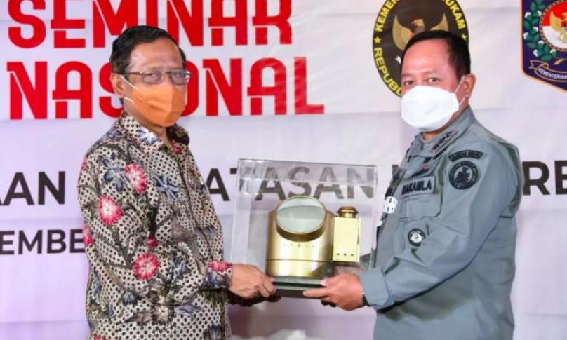 Menteri Koordinator Bidang Politik, Hukum dan Keamanan Moh. Mahfud MD dalam Seminar Nasional Pengelolaan Perbatasan Laut RI (Bakamla) di Hotel Mulia, Jakarta, Selasa (15/12/2020).